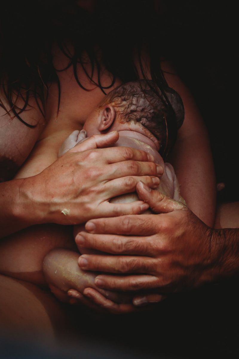 Newborn in mother's arms